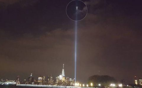 mysterious figure over twin towers 9/11 tribute