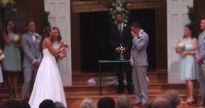 bride backs away - signs at wedding