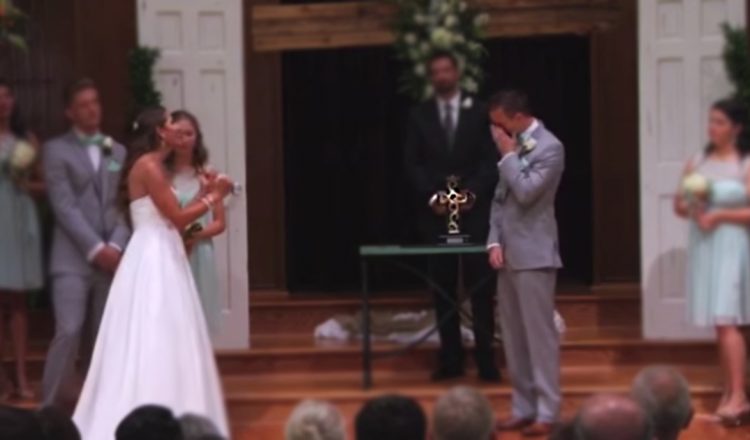 bride backs away - signs at wedding