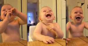 baby laughs at coconut