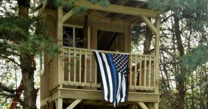 Police Officers Help Complete Treehouse for State Trooper's Daughter